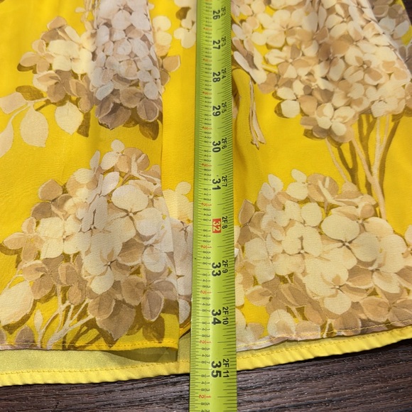 Trina Turk floral lined Dress in a beautiful yellow/ Tan printed fabric. - Picture 10 of 10